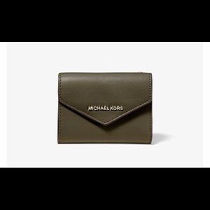 Authentic purple MK wallet